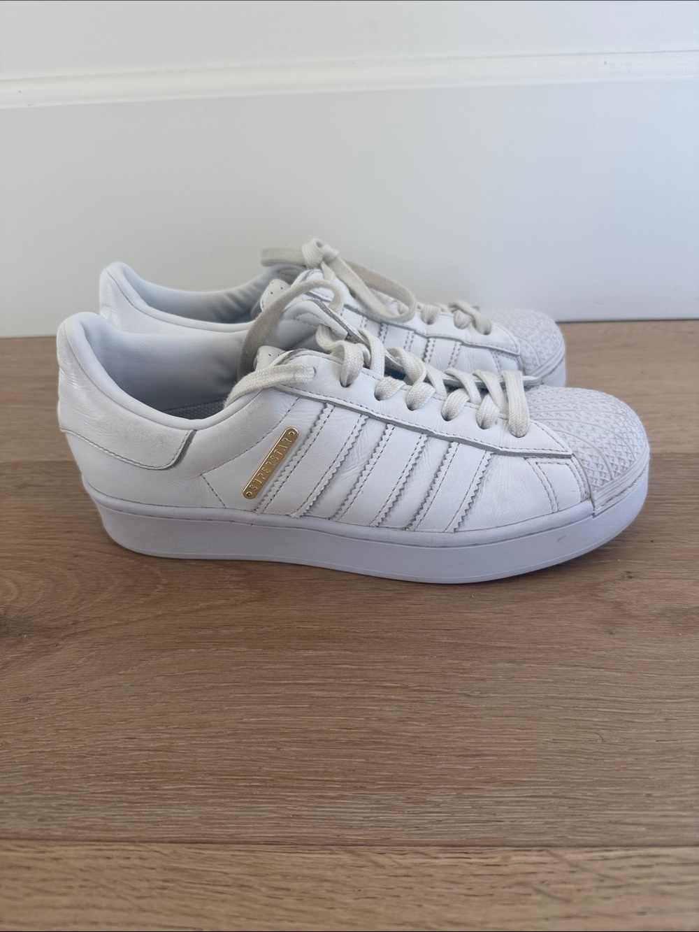 Classic White Women's Addidas Leather Sneaker with Gold tag